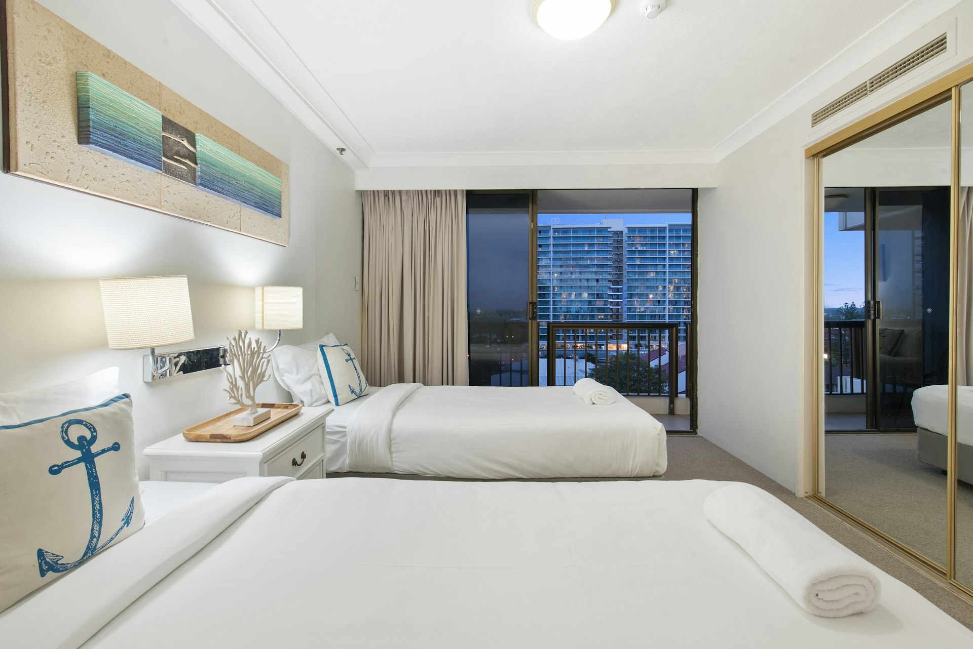 white bed linen on bed